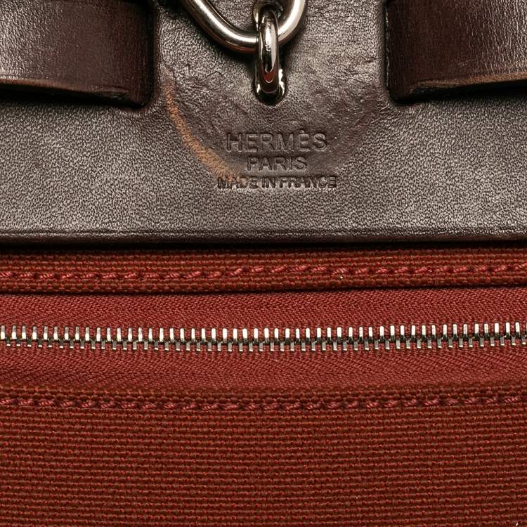 Pre Owned Hermes Rouge H/Ebene Canvas and Leather Herbag Zip 31 Bag