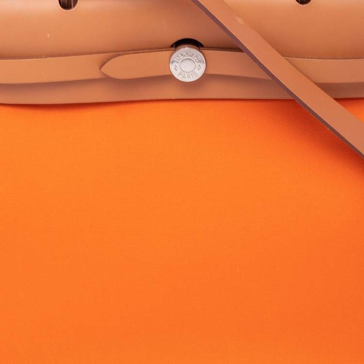 Pre Owned Hermes Orange/Natural Canvas and Leather Herbag Zip 31 Bag