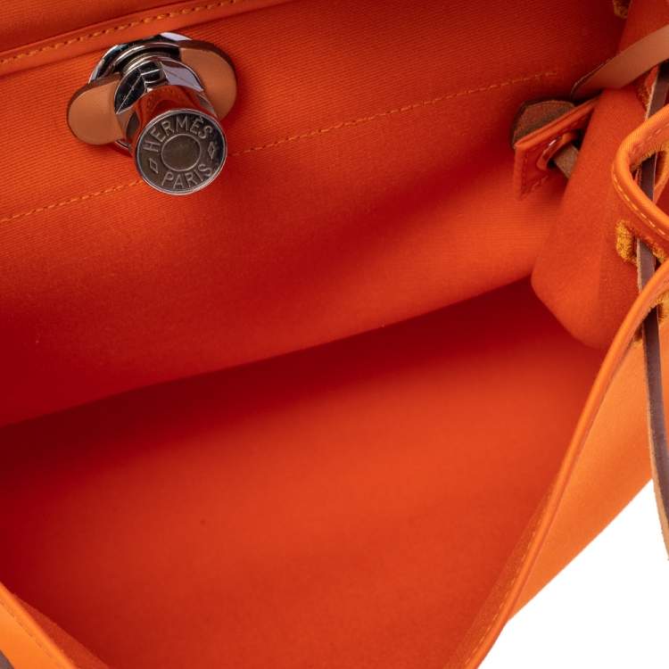Pre Owned Hermes Orange/Natural Canvas and Leather Herbag Zip 31 Bag