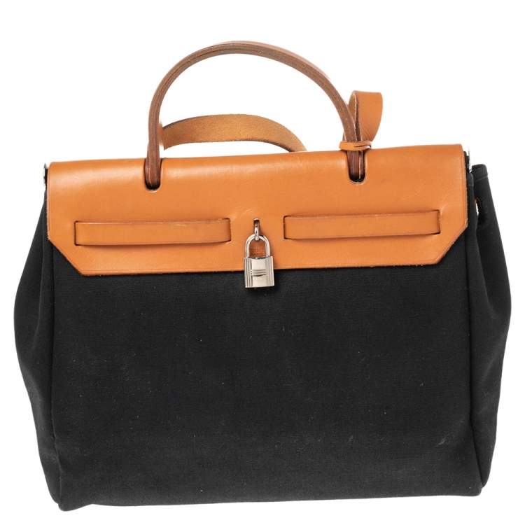 مملوكة مسبقًا Hermes Noir/Natural Canvas and Leather Herbag PM Bag
