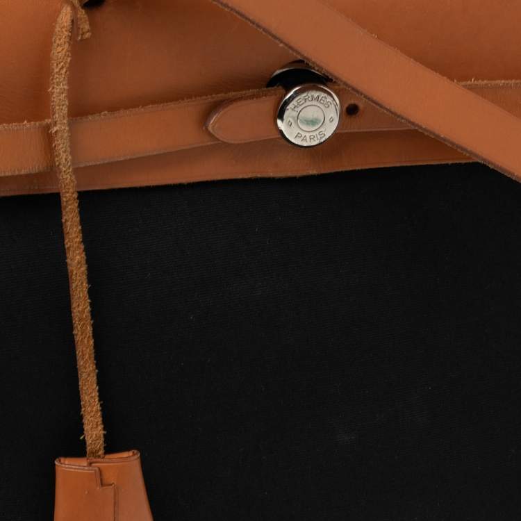 مملوكة مسبقًا Hermes Noir/Natural Canvas and Leather Herbag PM Bag