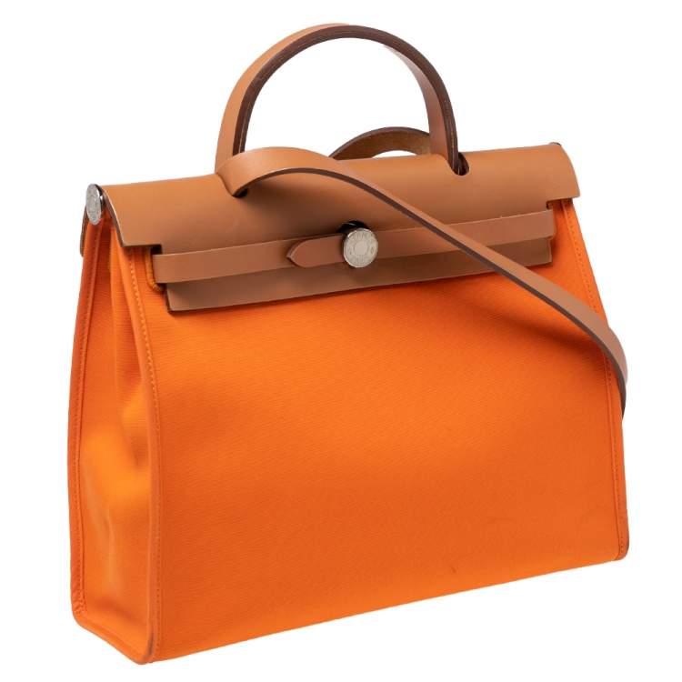 مملوكة مسبقًا Hermes Orange/Natural Canvas and Leather Herbag Zip PM Bag