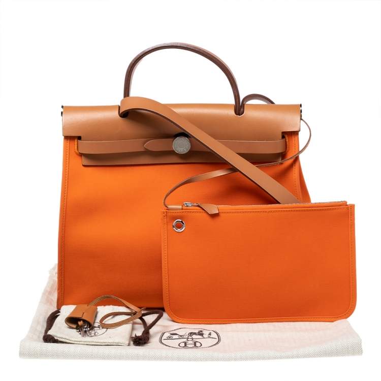 مملوكة مسبقًا Hermes Orange/Natural Canvas and Leather Herbag Zip PM Bag