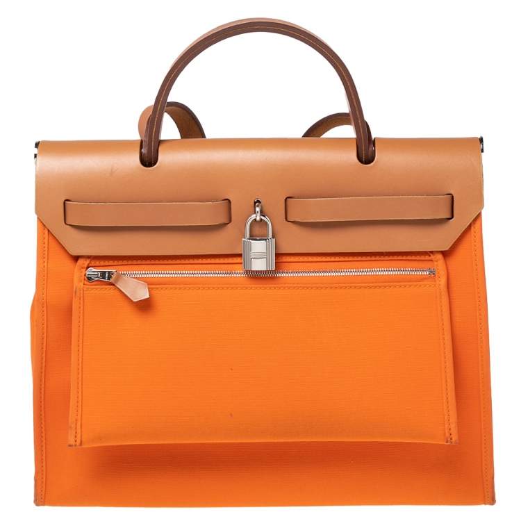 مملوكة مسبقًا Hermes Orange/Natural Canvas and Leather Herbag Zip PM Bag
