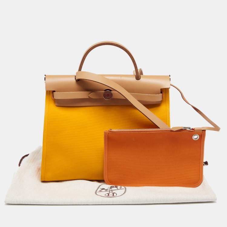 Pre Owned Hermes Jaune D'or/Natural Canvas and Leather Herbag Zip 31 Bag