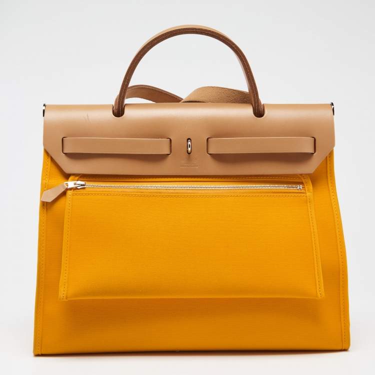 Pre Owned Hermes Jaune D'or/Natural Canvas and Leather Herbag Zip 31 Bag