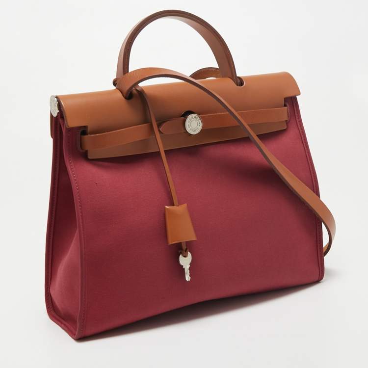 Pre Owned Hermes Ruby/Fauve Canvas and Leather Herbag Zip 31 Bag