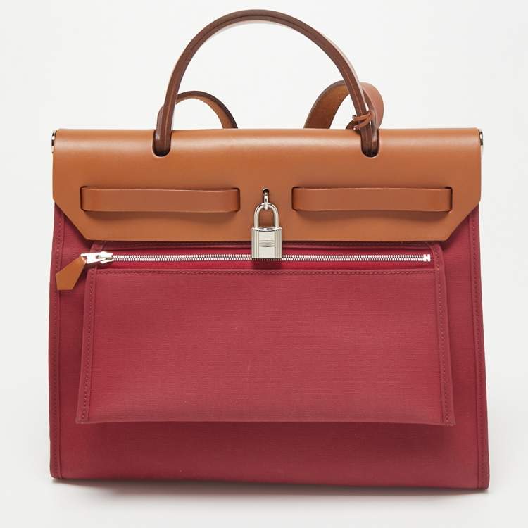 Pre Owned Hermes Ruby/Fauve Canvas and Leather Herbag Zip 31 Bag