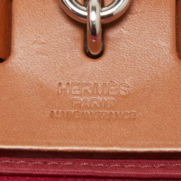 Pre Owned Hermes Ruby/Fauve Canvas and Leather Herbag Zip 31 Bag