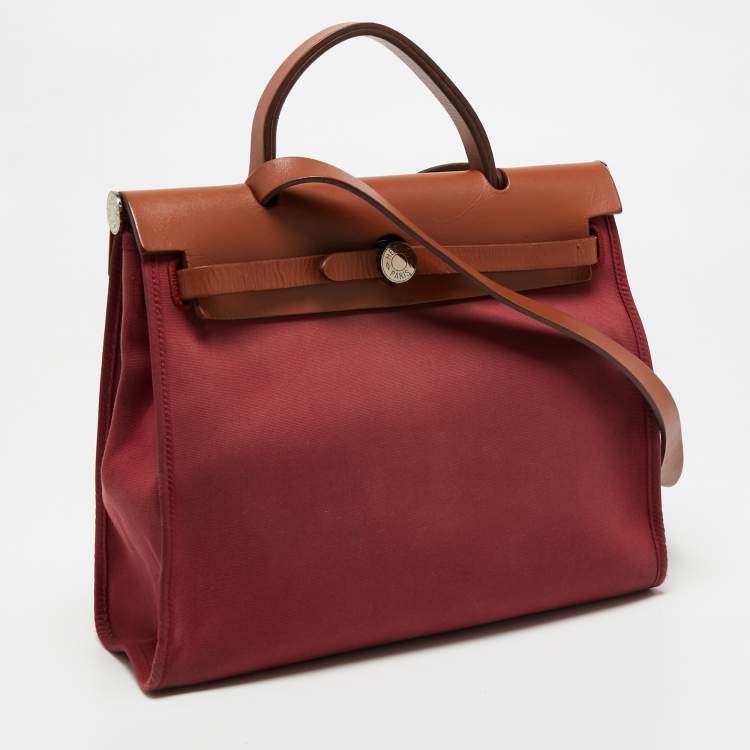 Pre Owned Hermes Ruby/Fauve Canvas and Leather Herbag Zip 31 Bag