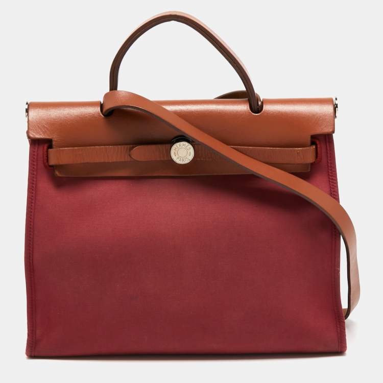 Pre Owned Hermes Ruby/Fauve Canvas and Leather Herbag Zip 31 Bag