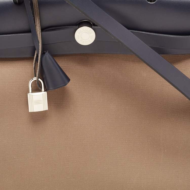 Pre Owned Hermes Vache Hunter/Toile Bleu Indigo/Etoupe Canvas and Leather Herbag Zip 31 Bag