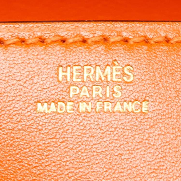 Pre Owned Hermes Orange Tadelakt Leather Medor 23 Clutch