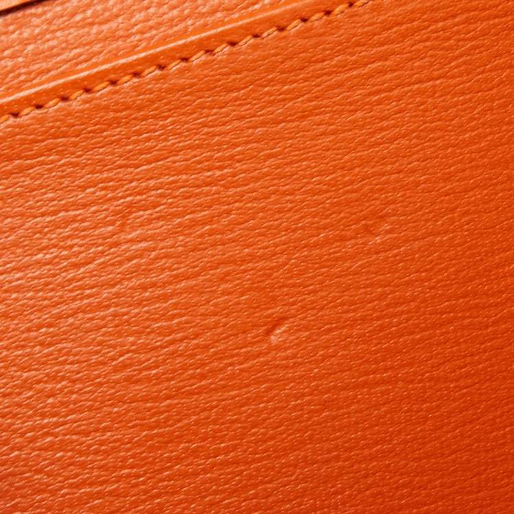 Pre Owned Hermes Orange Tadelakt Leather Medor 23 Clutch