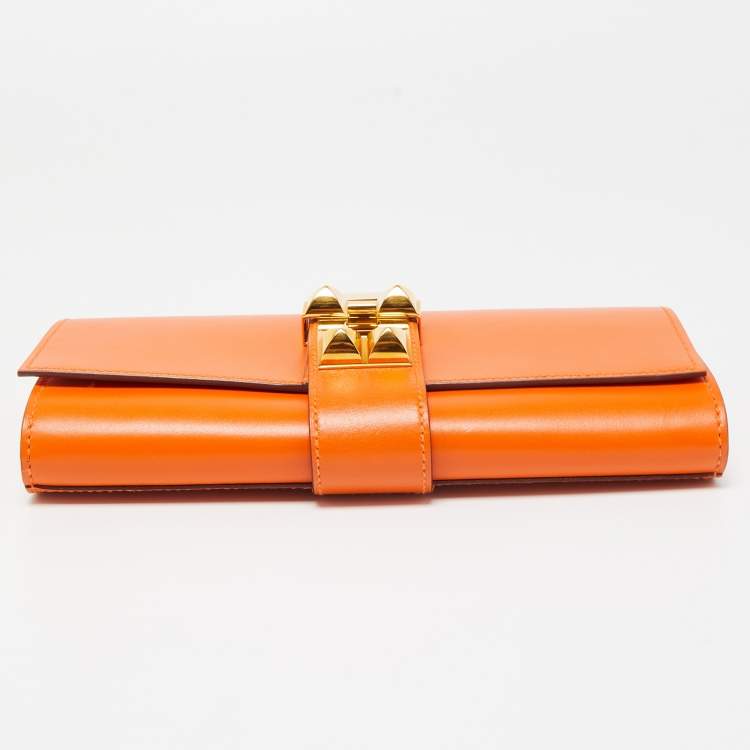 Pre Owned Hermes Orange Tadelakt Leather Medor 23 Clutch