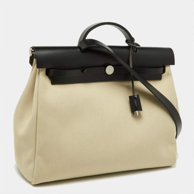 Pre Owned Hermès Beton/Black Toile Canvas and Vache Hunter Leather Herbag Zip 39 Bag