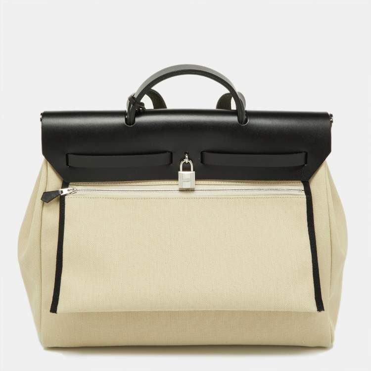 Pre Owned Hermès Beton/Black Toile Canvas and Vache Hunter Leather Herbag Zip 39 Bag