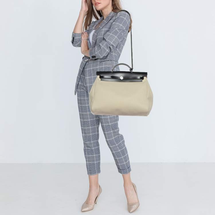Pre Owned Hermès Beton/Black Toile Canvas and Vache Hunter Leather Herbag Zip 39 Bag