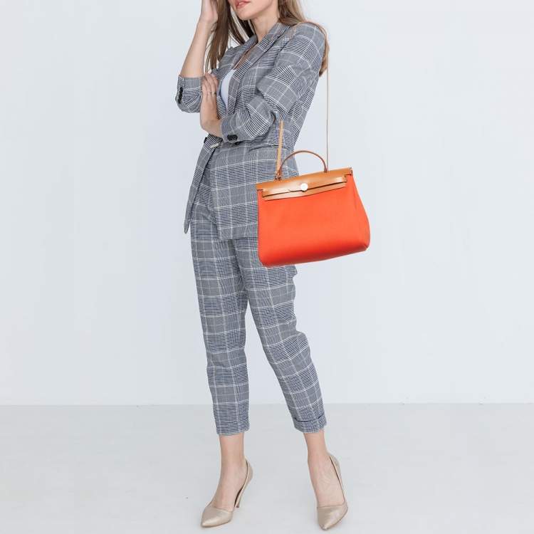 Pre Owned Hermes Orange/Fauve Canvas and Leather Herbag Zip 31 Bag