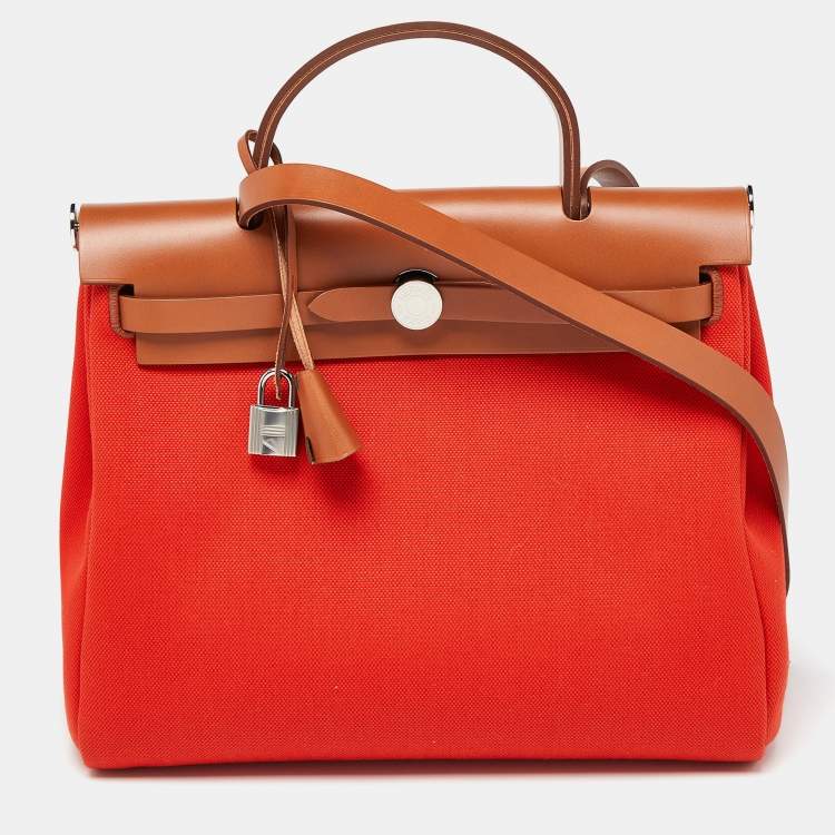 Pre Owned Hermes Orange/Fauve Canvas and Leather Herbag Zip 31 Bag