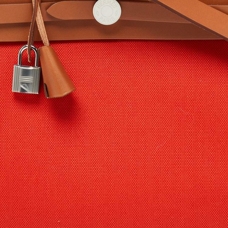 Pre Owned Hermes Orange/Fauve Canvas and Leather Herbag Zip 31 Bag