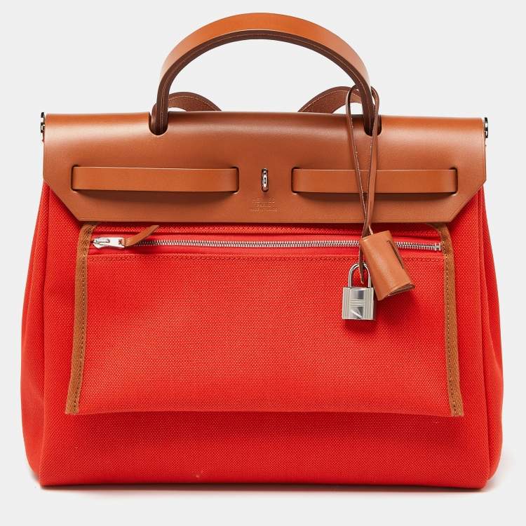 Pre Owned Hermes Orange/Fauve Canvas and Leather Herbag Zip 31 Bag