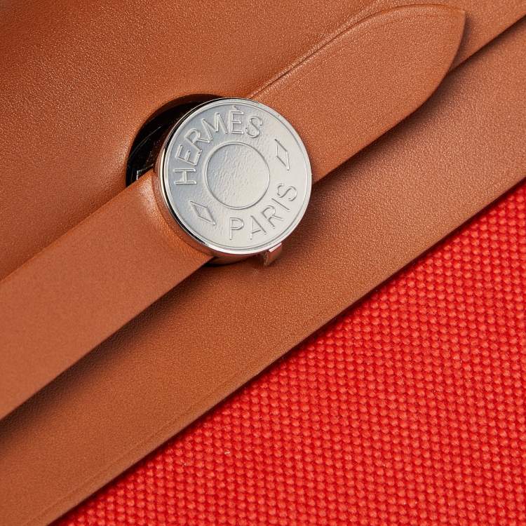 Pre Owned Hermes Orange/Fauve Canvas and Leather Herbag Zip 31 Bag