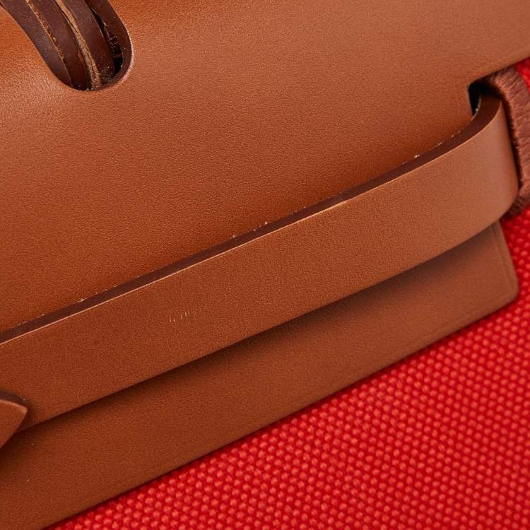Pre Owned Hermes Orange/Fauve Canvas and Leather Herbag Zip 31 Bag
