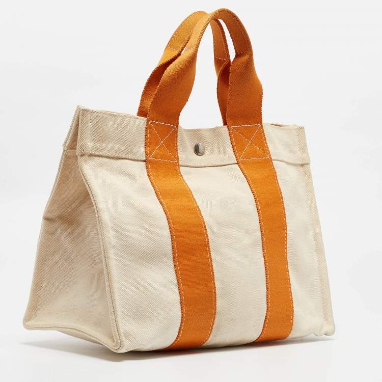 Pre Owned Hermes Cream/Orange Canvas Bora Bora PM Tote   