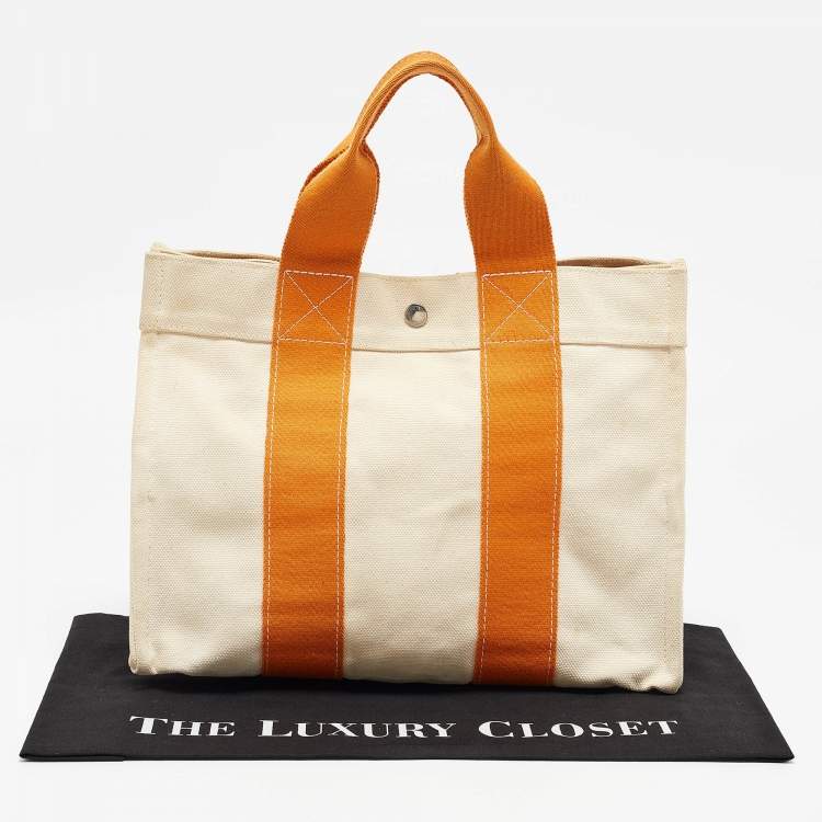 Pre Owned Hermes Cream/Orange Canvas Bora Bora PM Tote   