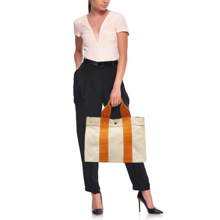 Pre Owned Hermes Cream/Orange Canvas Bora Bora PM Tote   