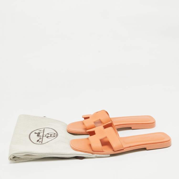 Pre Owned Hermes Light Orange Leather Oran Flat Slides Size 36.5