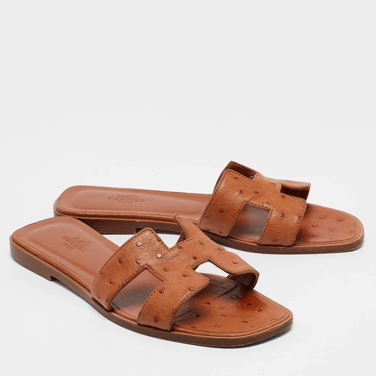 Pre Owned Hermes Brown Ostrich Leather Oran Flat Slides Size 37.5