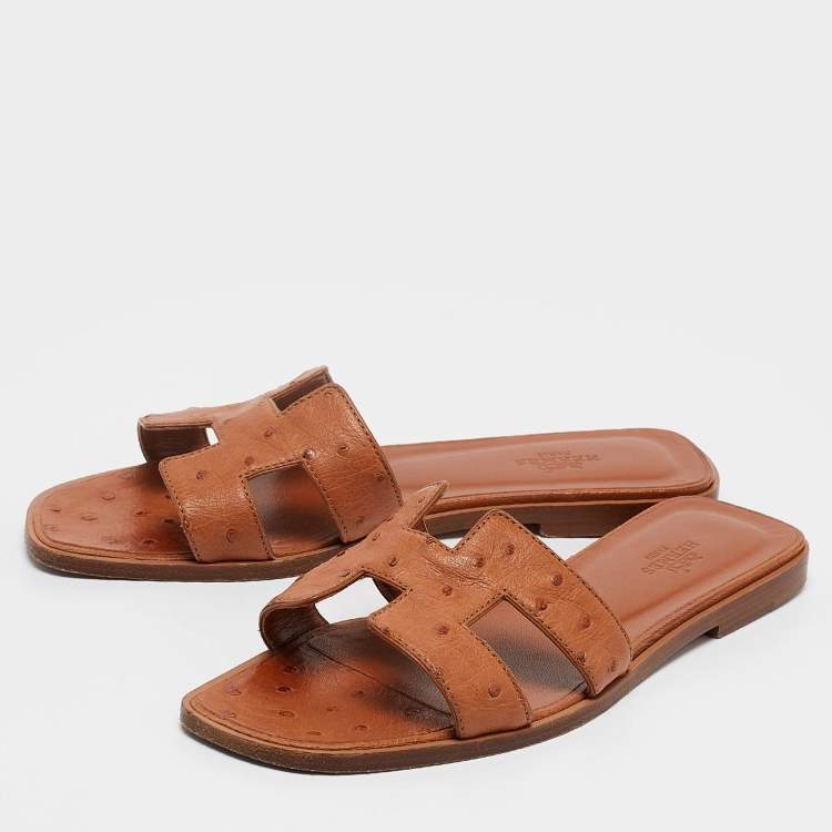 Pre Owned Hermes Brown Ostrich Leather Oran Flat Slides Size 37.5