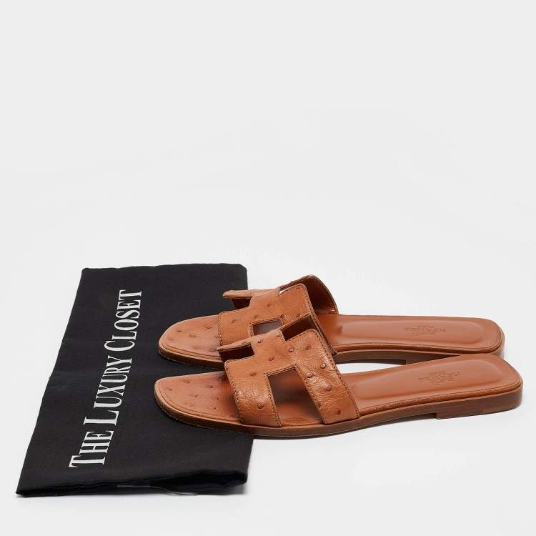Pre Owned Hermes Brown Ostrich Leather Oran Flat Slides Size 37.5