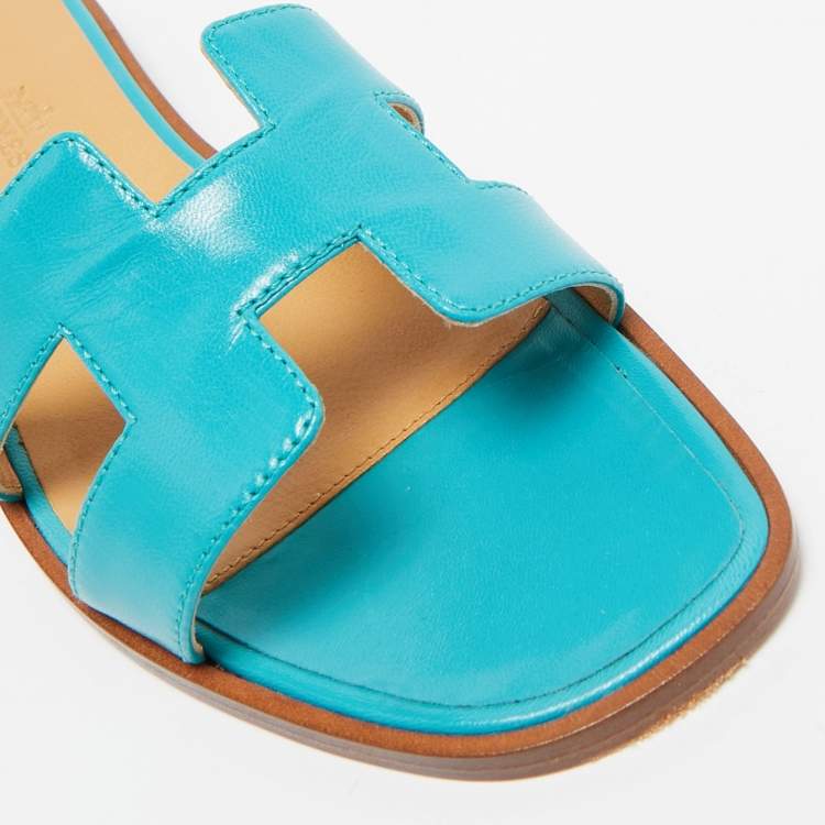Pre Owned Hermes Turquoise Leather Oran Flat Slides Size 36