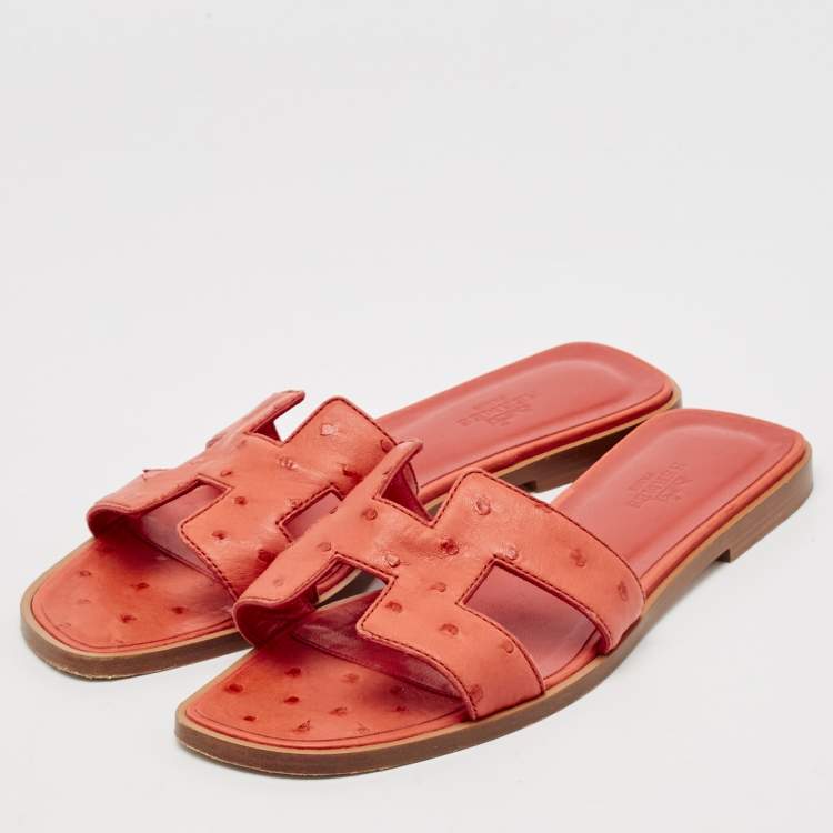 Pre Owned Hermes Orange Ostrich Leather Oran Flat Slides Size 36.5
