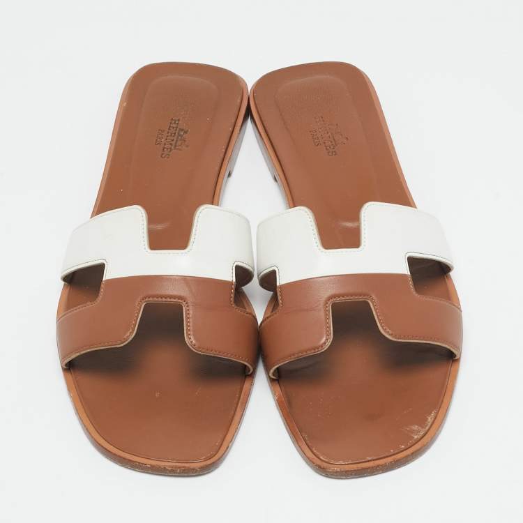 Pre Owned Hermes Brown/White Leather Oran Flat Slide Sandals Size 41