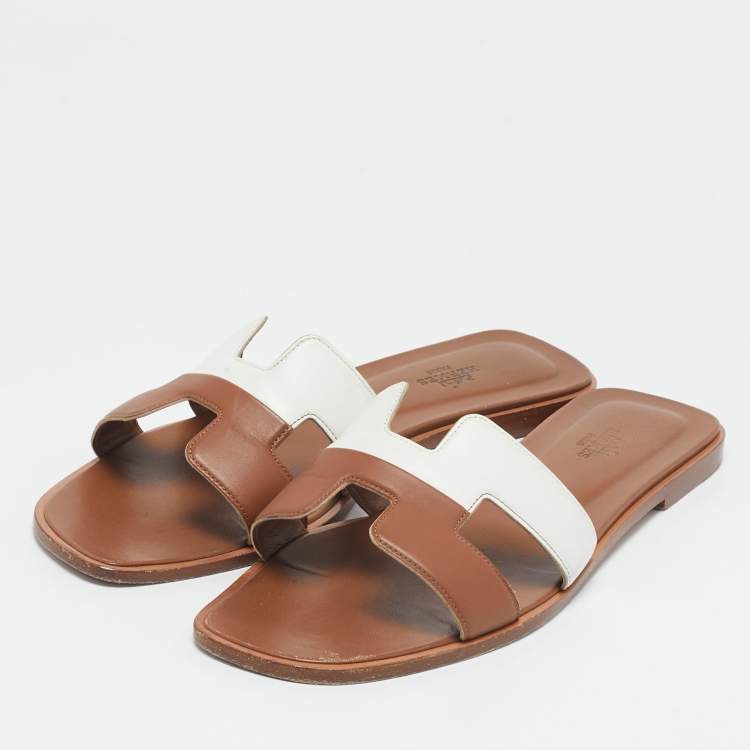 Pre Owned Hermes Brown/White Leather Oran Flat Slide Sandals Size 41