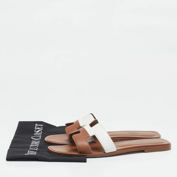 Pre Owned Hermes Brown/White Leather Oran Flat Slide Sandals Size 41