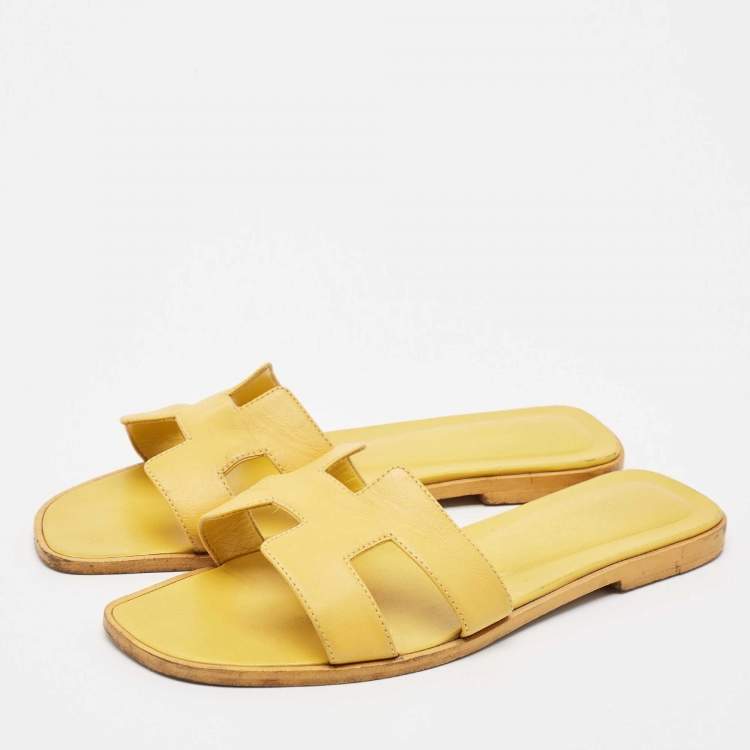 Pre Owned Hermes Yellow Leather Oran Flat Slides Size 38.5
