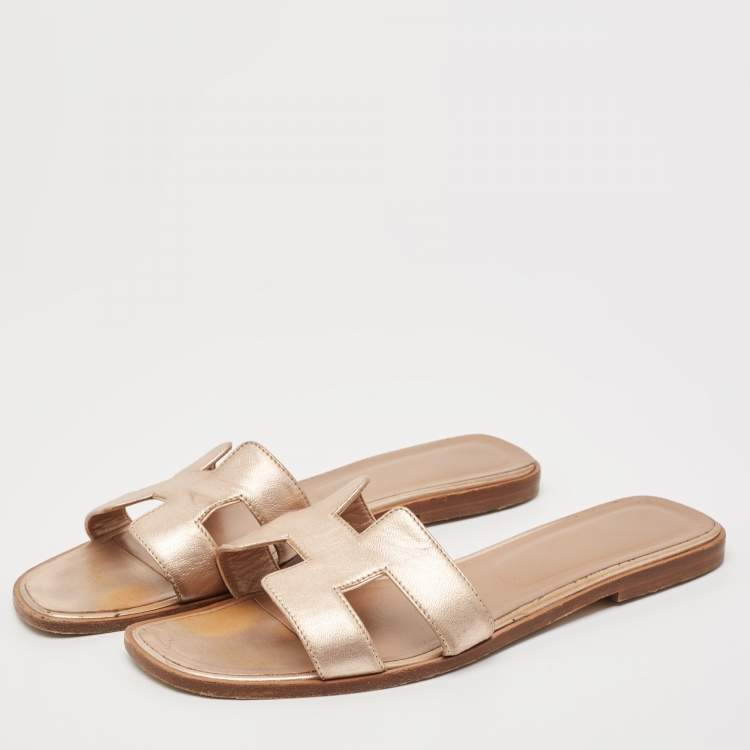 Pre Owned Hermes Metallic Gold Leather Oran Flat Sandals Size 41.5