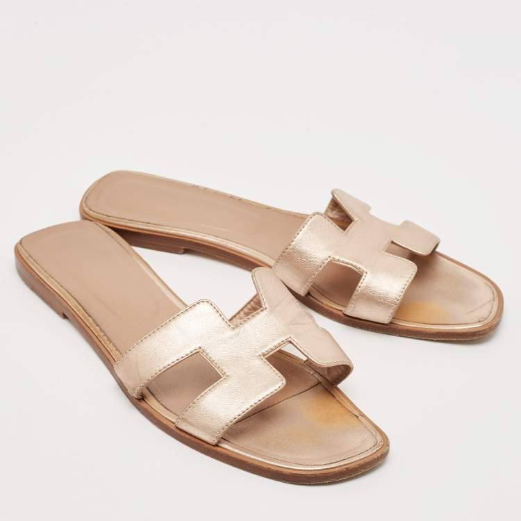 Pre Owned Hermes Metallic Gold Leather Oran Flat Sandals Size 41.5