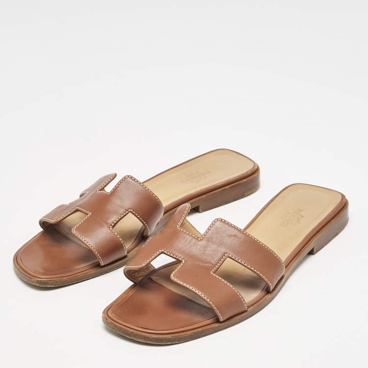 مملوكة مسبقًا Hermes Brown Leather Oran Flat Slides Size 37