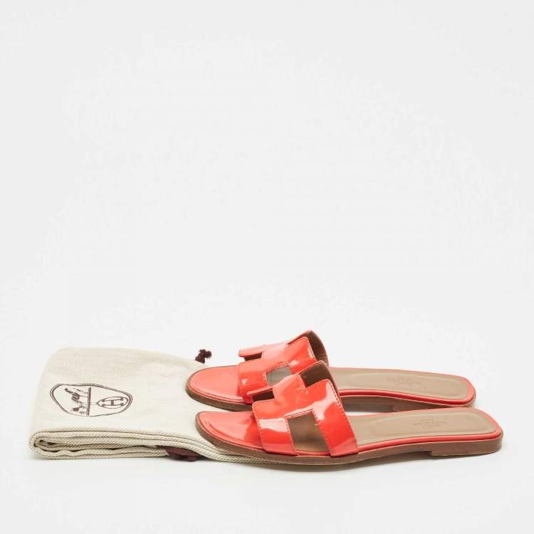 Pre Owned Hermes Orange Patent Oran Flat Slides Size 38
