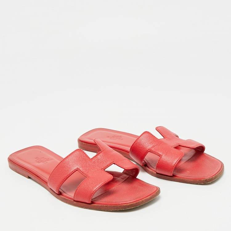 Pre Owned Hermes Coral Red Leather Oran Flat Slides Size 38