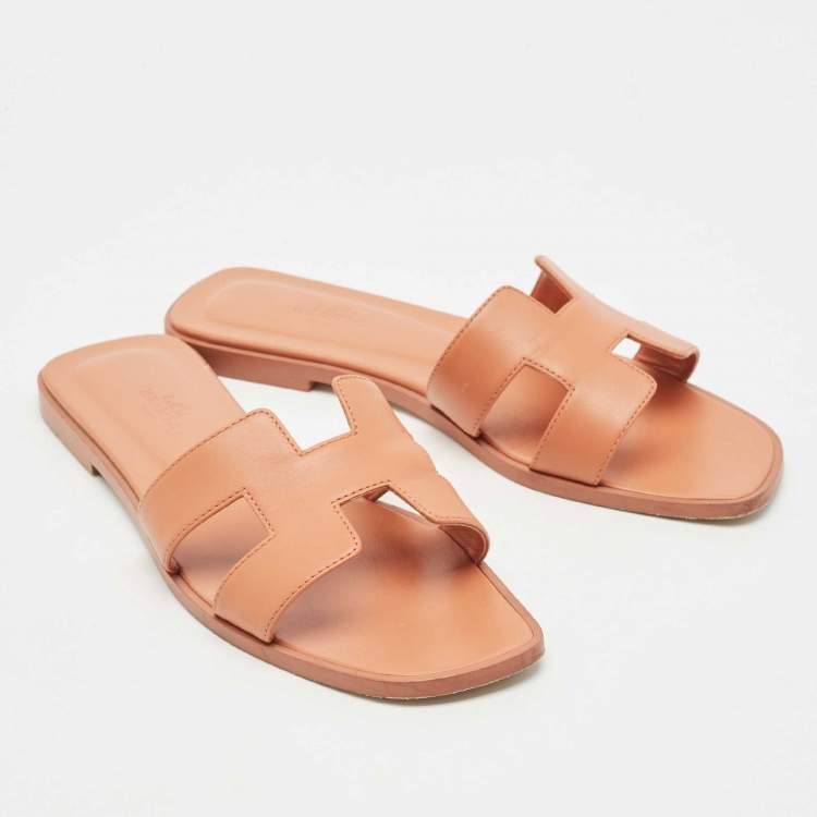 Pre Owned Hermes Peach Leather Oran Flat Slides Size 38