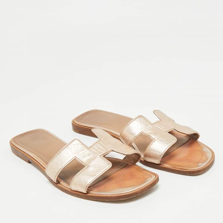 Pre Owned Hermes Metallic Bronze Leather Oran Flat Slides Size 36