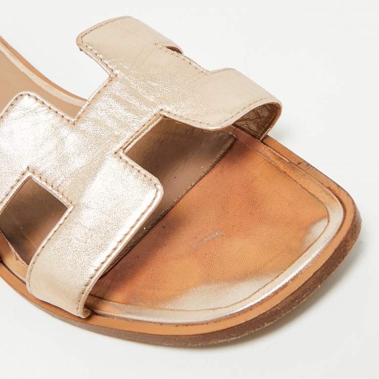 Pre Owned Hermes Metallic Bronze Leather Oran Flat Slides Size 36