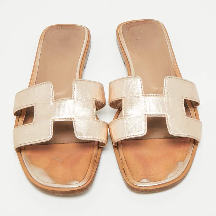Pre Owned Hermes Metallic Bronze Leather Oran Flat Slides Size 36